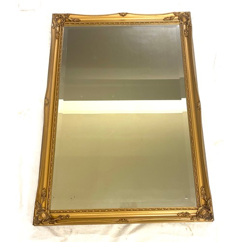 118 - Bevelled edge gilt framed mirror measures approx 33