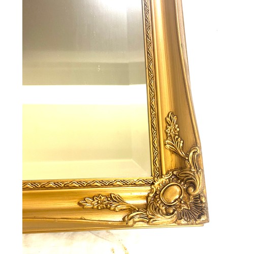 118 - Bevelled edge gilt framed mirror measures approx 33