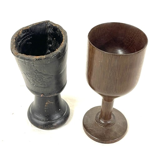 32 - 2 Vintage chalices includes one leather with rose design and one wooden, tallest measures approx 6.5... 