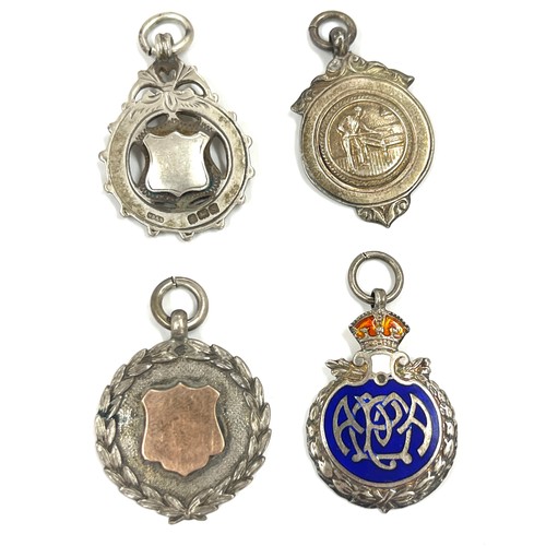 566 - Selection of 4 silver fobs includes one silver enamel
