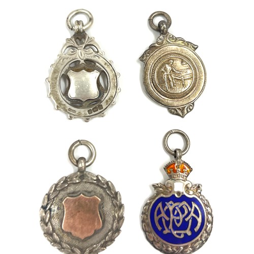 566 - Selection of 4 silver fobs includes one silver enamel