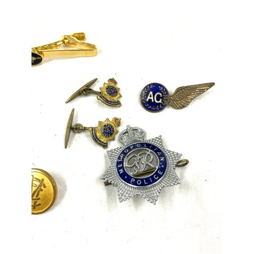 532 - Selection of collectable pieces to include Police badge, police cufflinks , buttons etc