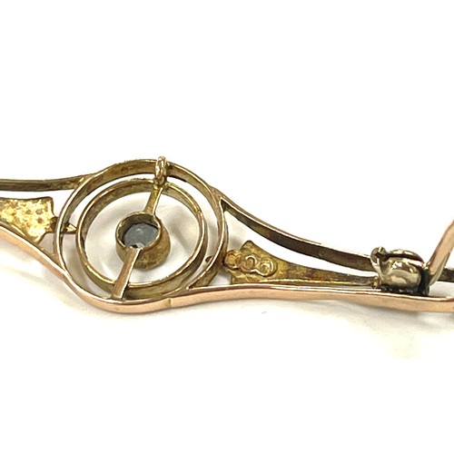 548 - 9ct gold hallmarked bar brooch, stone set, approximate weight 2.1g