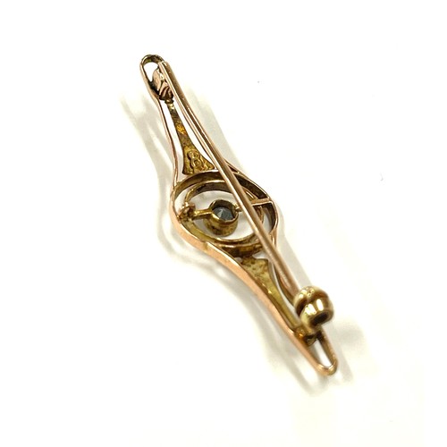 548 - 9ct gold hallmarked bar brooch, stone set, approximate weight 2.1g