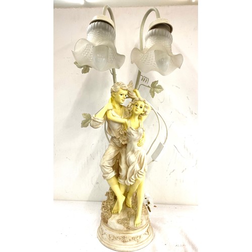 120 - Figurine lamp, working order, approximate height 26 inches