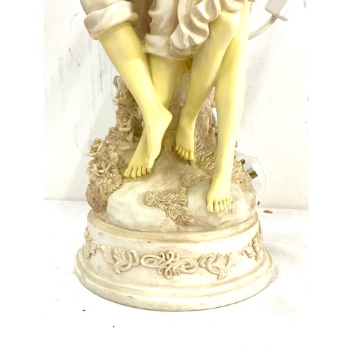 120 - Figurine lamp, working order, approximate height 26 inches