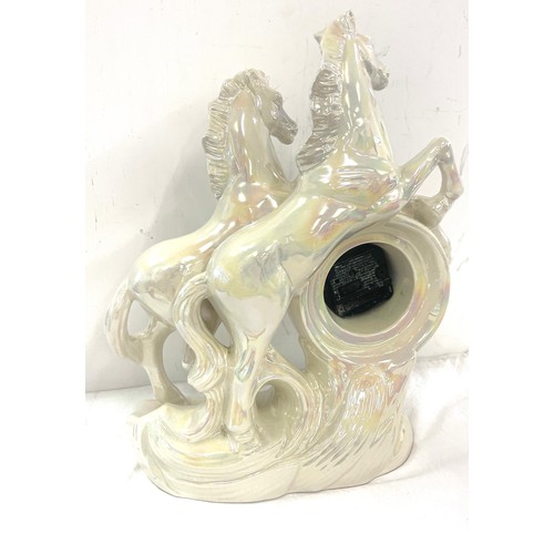 127 - Ornamental horse mantel clock, approximate height 15 inches, untested