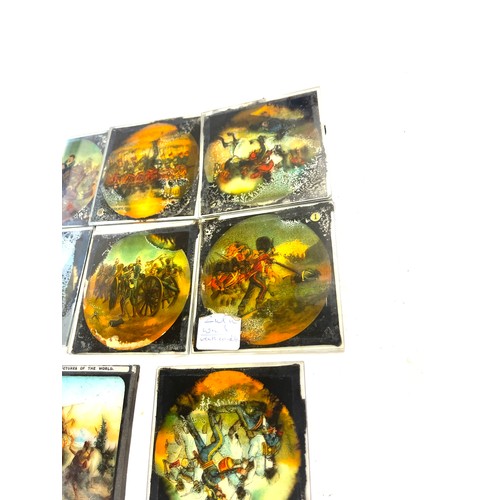 27 - 25 Magic lanterns, depicting famous pictures of the world, Zulu war etc