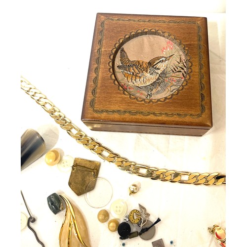 547 - Selection of costume jewellery in a vintage cash silk box