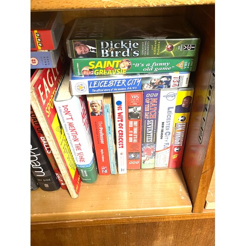 122 - Large selection of sports books and videos to include Football and cricket