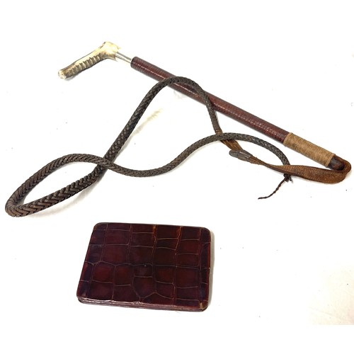 79 - Silver mounted leather riding crop - London 1938 and a crocodile skin wallet