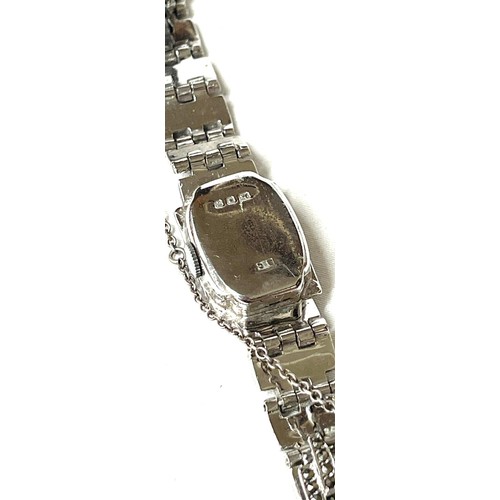 550 - Silver ladies vintage cocktail watch, winds and ticks but no warranty given