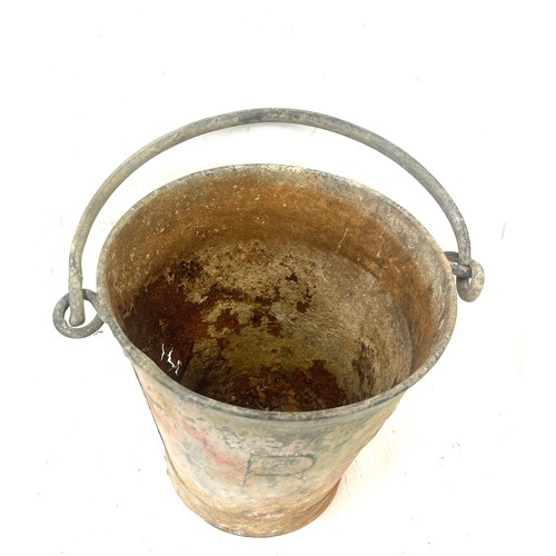 71 - Antique British Rail embossed fire bucket, height 11 inches, damage to front