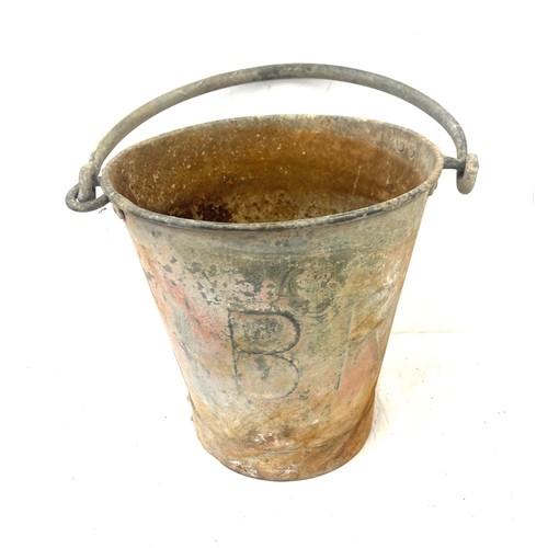 71 - Antique British Rail embossed fire bucket, height 11 inches, damage to front