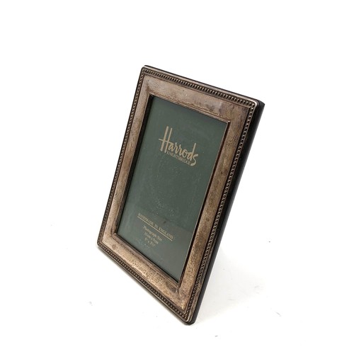 27 - Vintage Harrods Silver  picture frame measures approx 16cm by 12.5cm