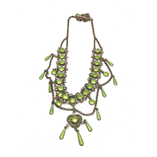 193 - An antique Scandinavian silver gilt necklace , with  lower filigree links and pale green enamel deco... 