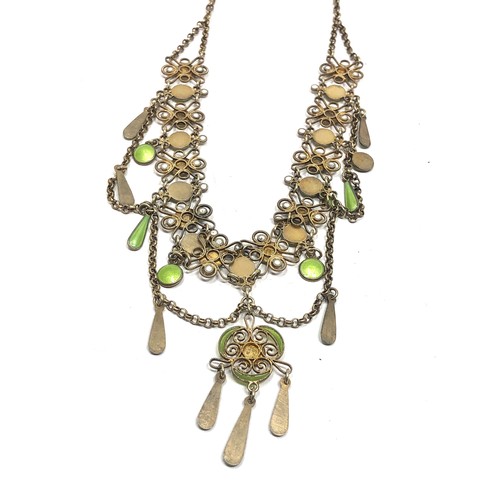 193 - An antique Scandinavian silver gilt necklace , with  lower filigree links and pale green enamel deco... 