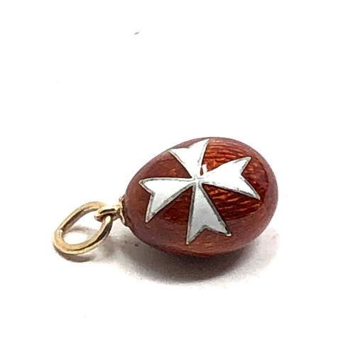 157 - rare antique 14 carat gold  Easter egg charm; finely made, with red enamel around a white enamel Mal... 