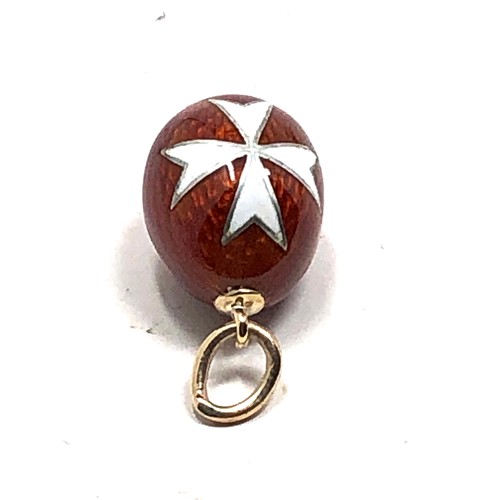 157 - rare antique 14 carat gold  Easter egg charm; finely made, with red enamel around a white enamel Mal... 