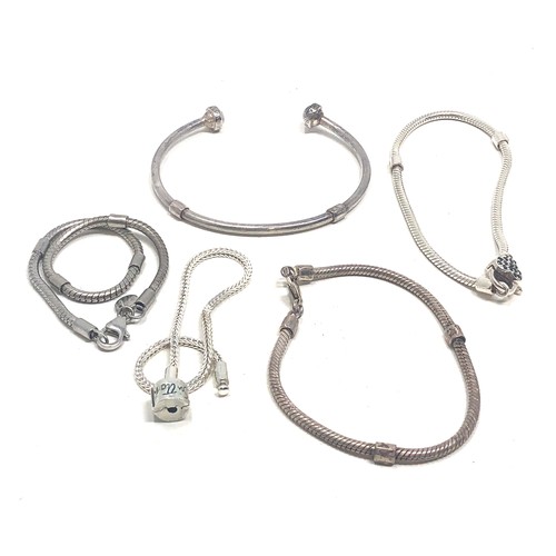 372 - 5 mixed brand silver charm bracelets