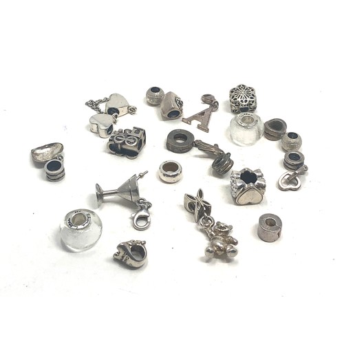 391 - 20 mixed brand silver charms