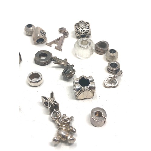 391 - 20 mixed brand silver charms