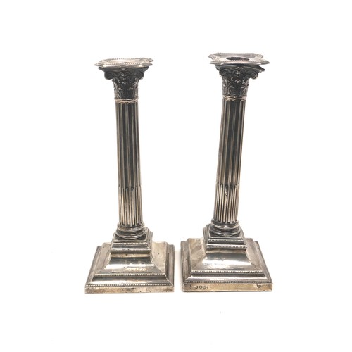 81 - Pair of silver Corinthian candlesticks measure approx 24cm high Sheffield silver hallmarks age relat... 