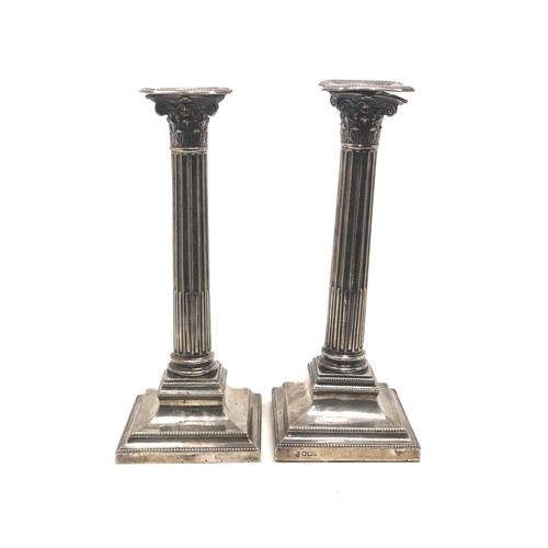 81 - Pair of silver Corinthian candlesticks measure approx 24cm high Sheffield silver hallmarks age relat... 