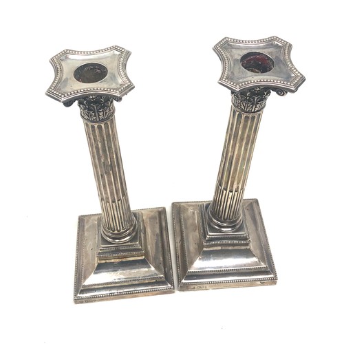 81 - Pair of silver Corinthian candlesticks measure approx 24cm high Sheffield silver hallmarks age relat... 