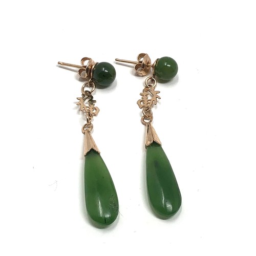 148 - A pair antique 9 ct  gold long drop nephrite earrings, with stud wires measure approx 4.8cm drop