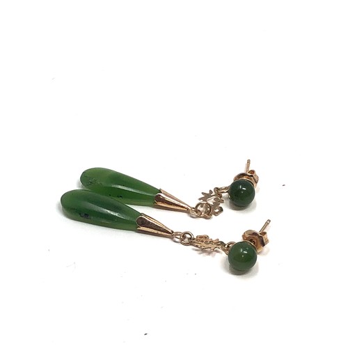 148 - A pair antique 9 ct  gold long drop nephrite earrings, with stud wires measure approx 4.8cm drop