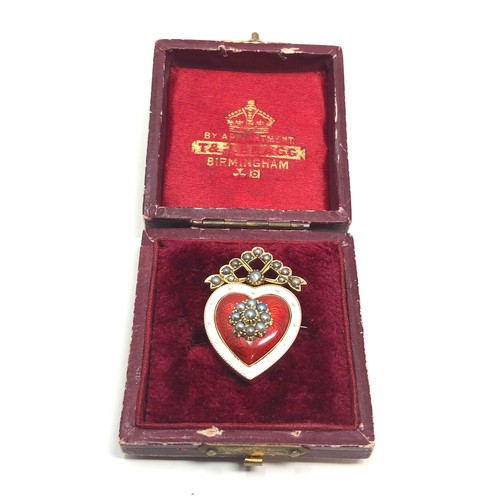 168 - A fine antique 15 ct  gold brooch with red guilloche enamel, white enamel bordered heart-shaped body... 