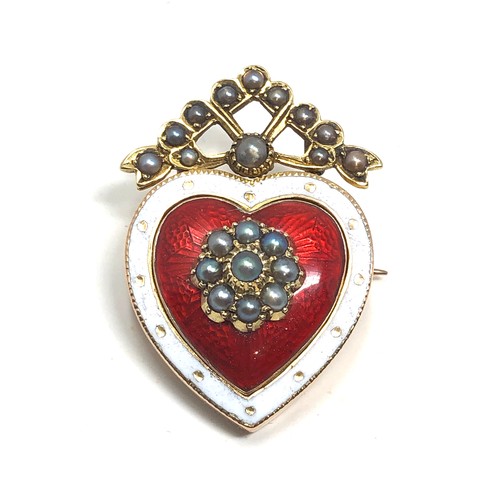 168 - A fine antique 15 ct  gold brooch with red guilloche enamel, white enamel bordered heart-shaped body... 