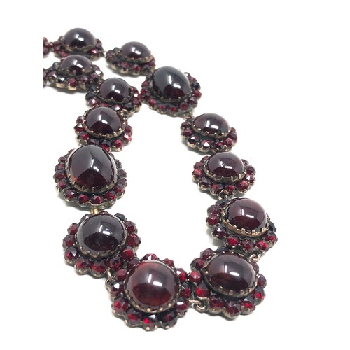 149 - Fine antique cabochon garnet necklace, with a snap clasp set with an array of foiled rose cut &  cab... 