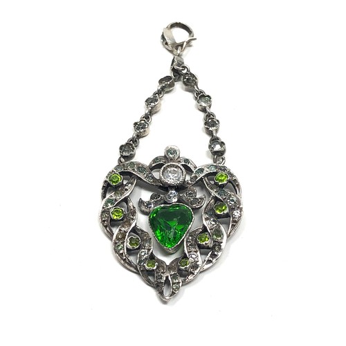 184 - An antique silver pendant & paste stones  measures approx 65 mm drop by x 25 mm wide