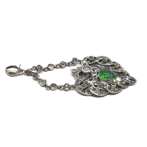 184 - An antique silver pendant & paste stones  measures approx 65 mm drop by x 25 mm wide