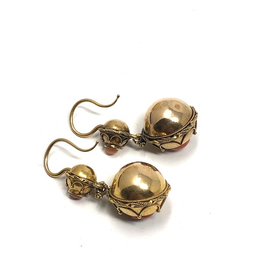 122 - A pair of antique 15ct gold coral & rose diamond  orb drop earring set with coral insets with rose c... 