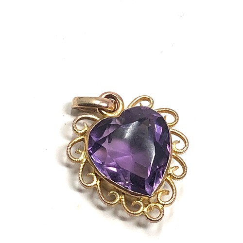 199 - An antique 9ct  gold amethyst heart pendant measures approx  16 x 13 mm