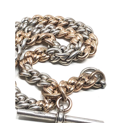 141 - An unusual antique Albert watch chain, with alternating strands of 9 carat gold &  sterling silver l... 