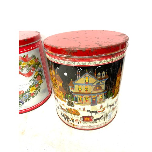 89 - 2 Large vintage Christmas tins, overall height 28cm, diameter 25cm