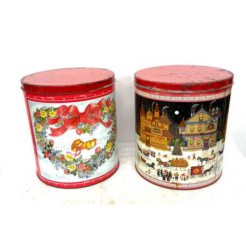 89 - 2 Large vintage Christmas tins, overall height 28cm, diameter 25cm