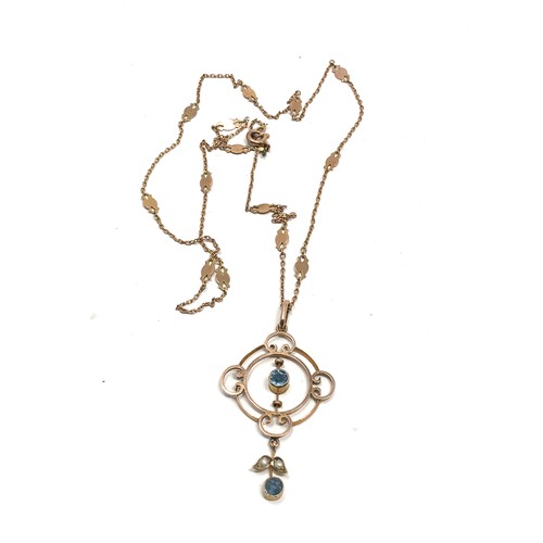 189 - An antique Edwardian 9 carat gold pendant set with  pearls and aquamarines, hung on a 9k gold fancy ... 