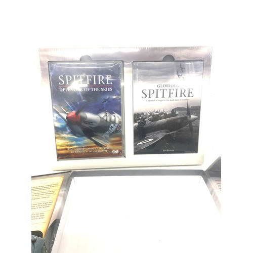 66 - Vintage spitfire book with discs and the unknown war book