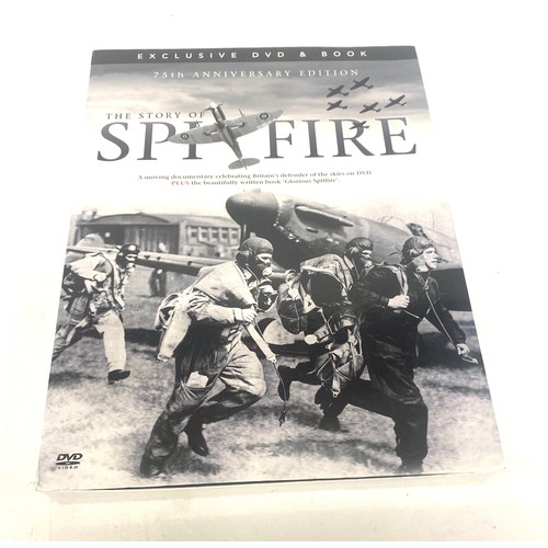 66 - Vintage spitfire book with discs and the unknown war book