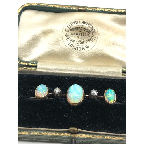 181 - Boxed antique 15ct gold opal & rose diamond brooch;  set three opal cabochons and two rose cut diamo... 