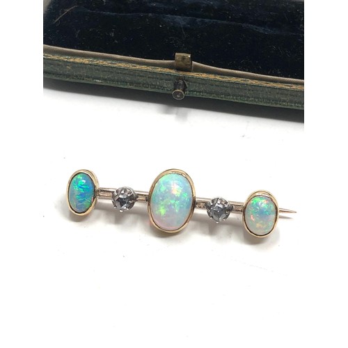 181 - Boxed antique 15ct gold opal & rose diamond brooch;  set three opal cabochons and two rose cut diamo... 