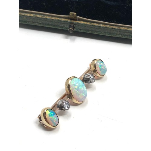 181 - Boxed antique 15ct gold opal & rose diamond brooch;  set three opal cabochons and two rose cut diamo... 