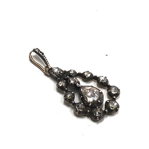 202 - An antique Georgian silver & gold backed rose diamond pendant  measures approx : 30 x 14 mm (