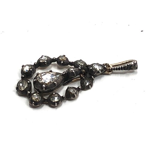 202 - An antique Georgian silver & gold backed rose diamond pendant  measures approx : 30 x 14 mm (