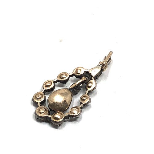 202 - An antique Georgian silver & gold backed rose diamond pendant  measures approx : 30 x 14 mm (